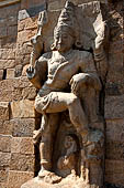 The great Chola temples of Tamil Nadu - The Brihadisvara temple of Gangaikondacholapuram. Huge monolith dvarapala guarding the entrance of the temple. 